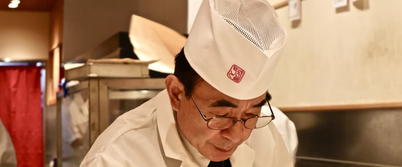 Chef in white hat