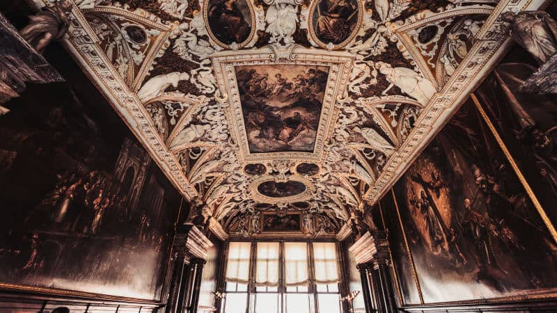 Grandiose ceiling frescoes adorn the many rooms